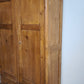 218 Armadio due ante in legno con cassetto inferiore