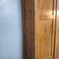 218 Armadio due ante in legno con cassetto inferiore