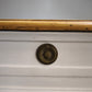 91977 Grande tavolo con base bianca e piano color legno