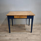 91978 Tavolo con base azzurra e piano color legno