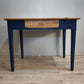 91978 Tavolo con base azzurra e piano color legno