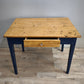 91978 Tavolo con base azzurra e piano color legno