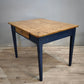 91978 Tavolo con base azzurra e piano color legno