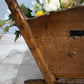92239 Antica culla in legno con fiori sintetici