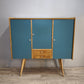 92381 Highboard in legno con sportelli dipinti e pomelli in vetro