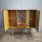 92381 Highboard in legno con sportelli dipinti e pomelli in vetro