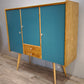 92381 Highboard in legno con sportelli dipinti e pomelli in vetro