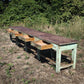 Bancone industriale vintage in legno con piano rivestito in ferro