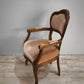 92587 Poltroncina in legno e tessuto rosa con braccioli
