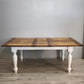 92593 Tavolo allungabile con base bianca e piano in legno