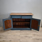 92591 Credenzina due sportelli dipinta azzurra con piano in legno