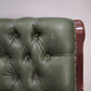 93052 Poltrona a dondolo con struttura in legno e rivestimento in simil pelle verde