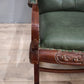 93052 Poltrona a dondolo con struttura in legno e rivestimento in simil pelle verde