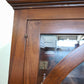 257 Vetrina in legno con due sportelli e due cassetti