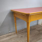 93258 Tavolo allungabile con piano in formica rossa
