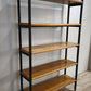 93279 Libreria con struttura in ferro e ripiani in legno