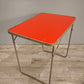 93309 Tavolo vintage pieghevole con piano rosso