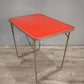 93309 Tavolo vintage pieghevole con piano rosso