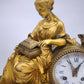 93221 Orologio con dama in metallo dorato e alzata in legno