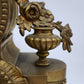 93221 Orologio con dama in metallo dorato e alzata in legno