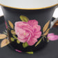93826 Set n 4 tazzine con piattino in ceramica Limoges Sévrès nere con decorazione rose