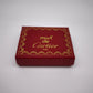 93862 Scatolina Must de Cartier in cartone