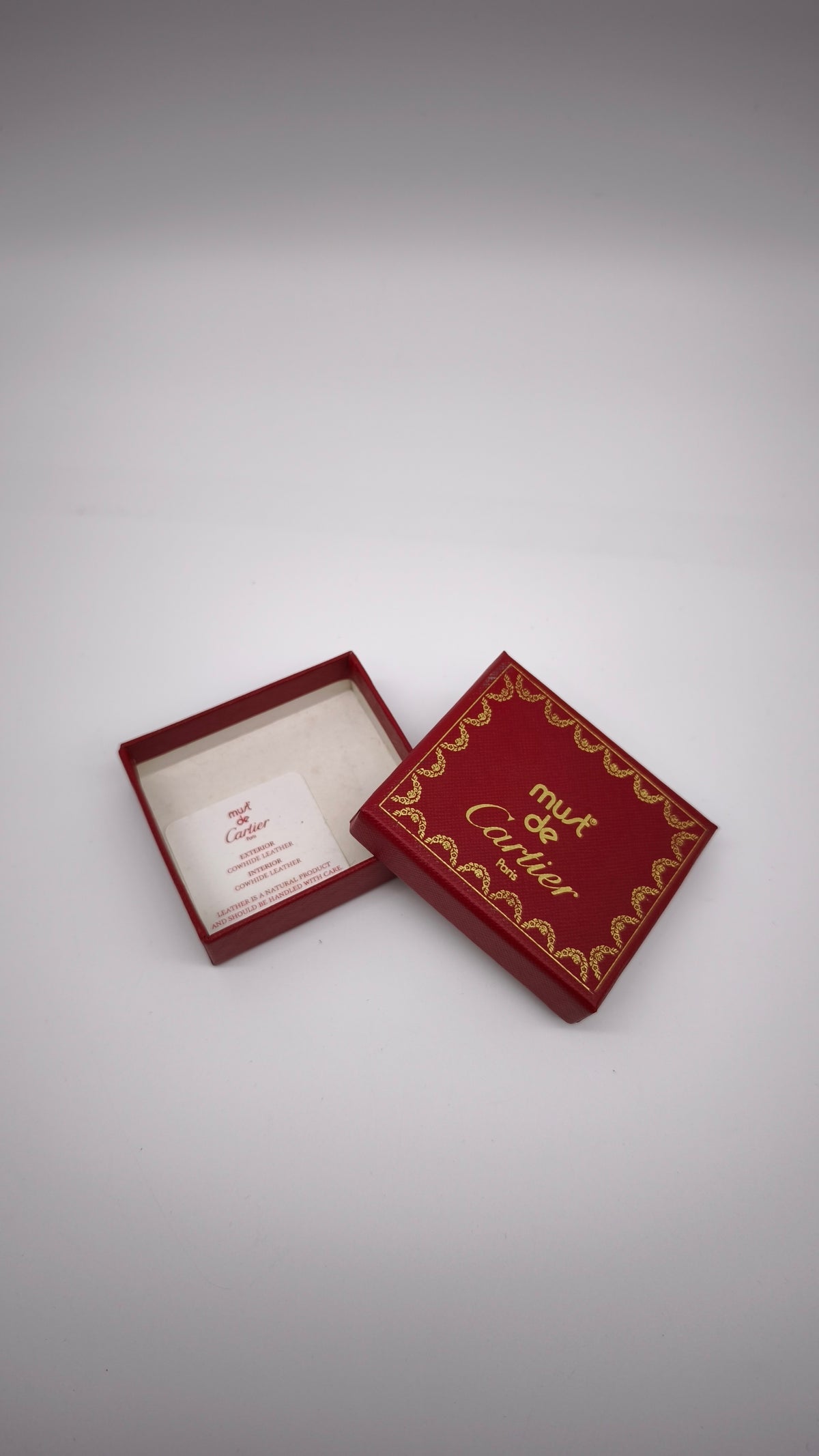 93862 Scatolina Must de Cartier in cartone