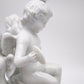 93872 Gruppo di puttini suonatori su uovo in ceramica bianca Ginori (Capodimonte)