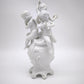 93872 Gruppo di puttini suonatori su uovo in ceramica bianca Ginori (Capodimonte)